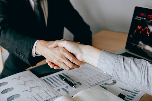 Two businessmen shaking hands