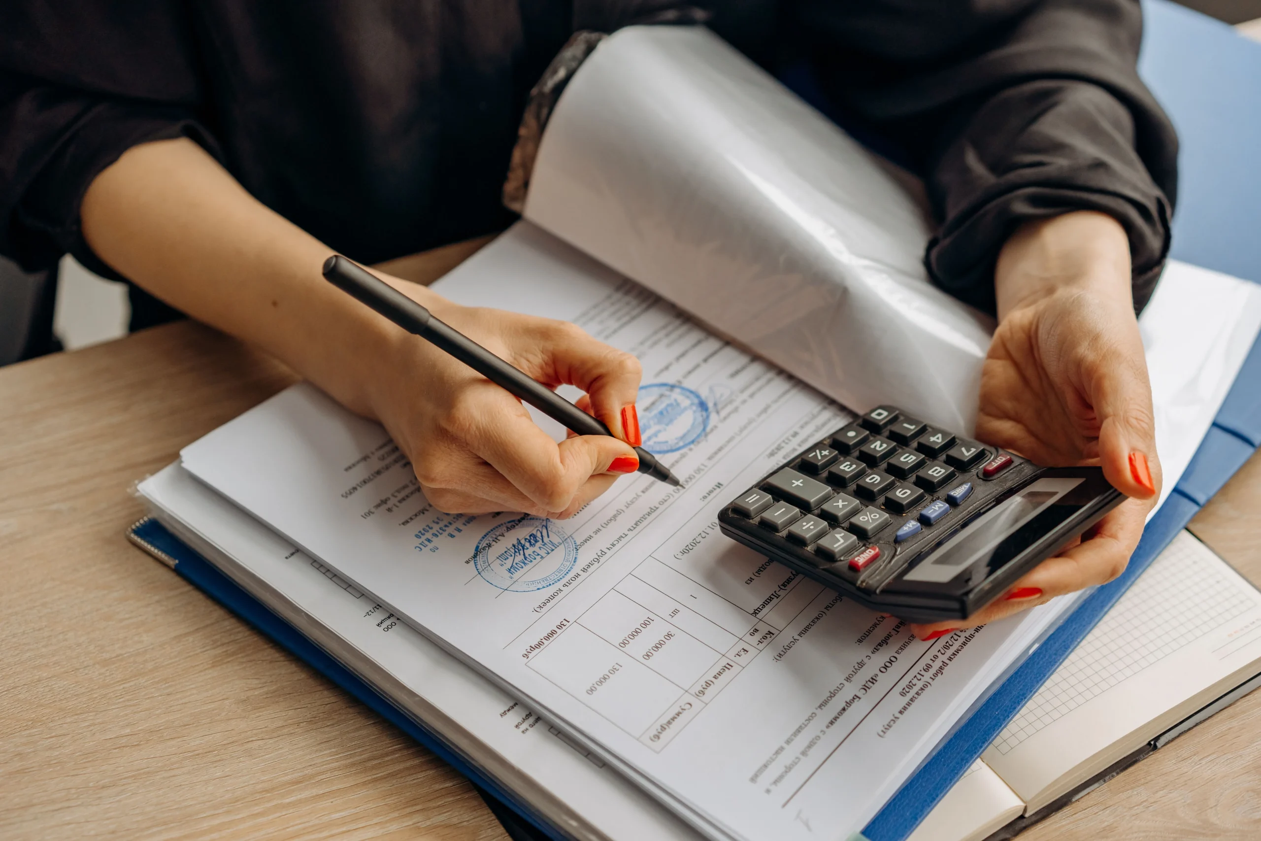 Alder compliance auditor reviewing internal financial controls and documents for an independent MAS regulatory gap assessment