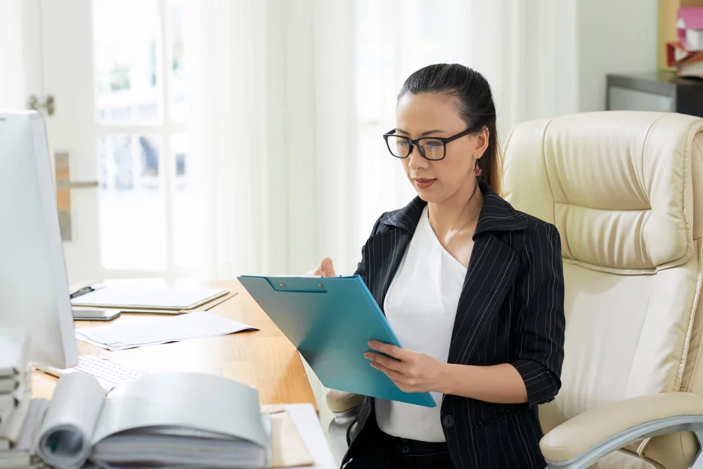 Data Protection Officer conducting a PDPA compliance review for a Singapore business